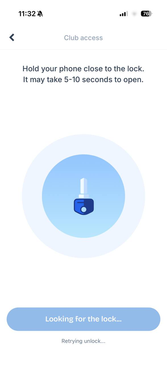 The Club access screen in a club's branded app, telling the customer to hold their phone close to the lock while it searches for it.